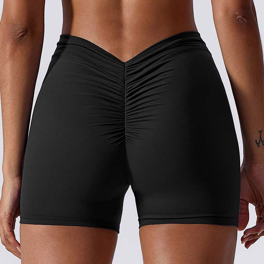 Color sólido cintura espalda V arrugas cadera elevación desnuda pantalones de tres puntos pantalones de yoga elásticos transpirables pantalones cortos de fitness de secado rápido para mujeres