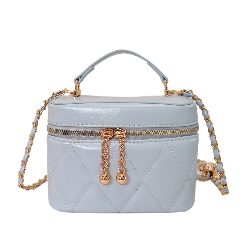 Caja de mano de nicho coreana, bolso pequeño cuadrado para mujeres 2026 nueva cadena de diamante moda versátil bolso de lujo ligero