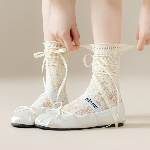 Pure and alluring ballet-style girl's lace socks, calf-length with ribbon bow and cut-out design, breathable white mesh puffy socks.