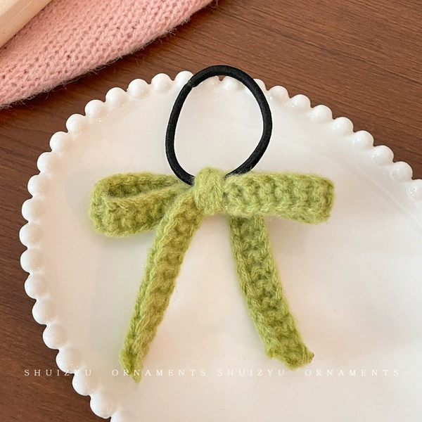 Green hairgrip with bow
