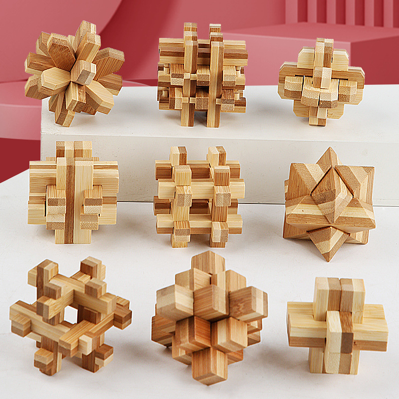 Suministro directo de fábrica para niños rompecabezas de desbloqueo Kong Ming traje de bloqueo de bambú Luban bloqueo traje de inteligencia juguetes al por mayor