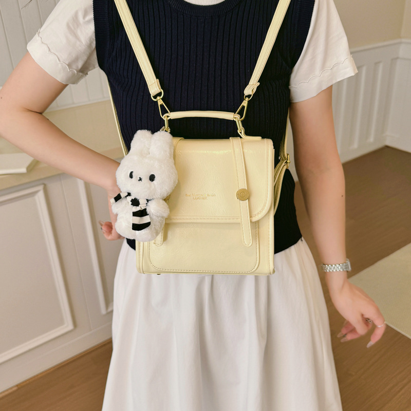 Cantos colgantes de dibujos animados de hombro pequeño bolso de mujer de verano estilo coreano nicho color sólido mochila mujer