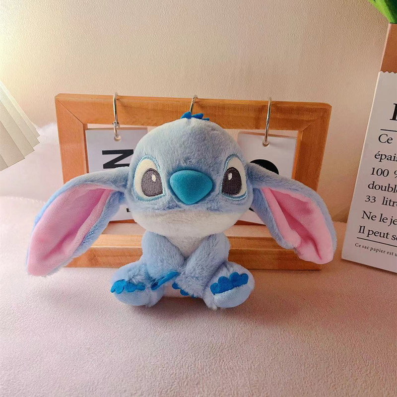 Tiktok estrella caliente bebé púrpura puntada felpa muñeca llavero colgante lindo de dibujos animados bolsa adornos