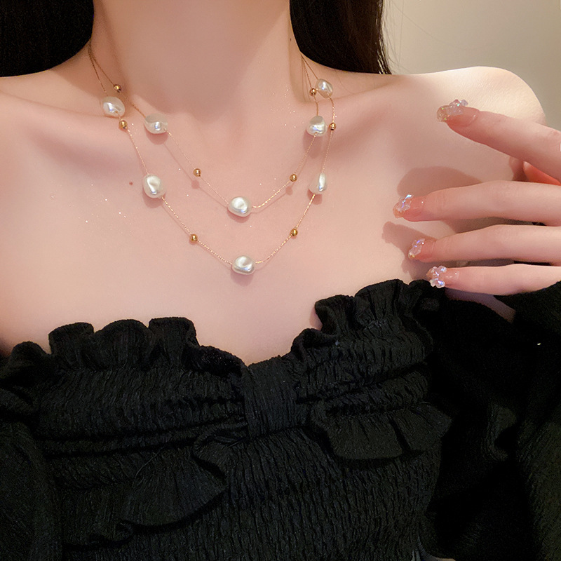 Collar de perlas con lazo de flor con cuentas francesas Elegante cadena de clavícula con sentido de alta gama retro ligero decoración de lujo femenino