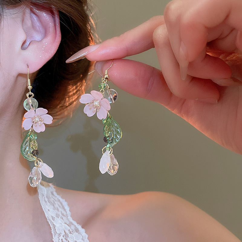 Pendientes de borla de hilo de malla de flor de aguja de plata Pendientes de estilo de vacaciones junto al mar frescos y dulces Pendientes de ambiente de moda y versátil