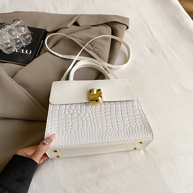 Bolso de diseño de nicho de alto nivel para mujeres 2024 nueva moda versátil bolso de hombro portátil bolso de viaje