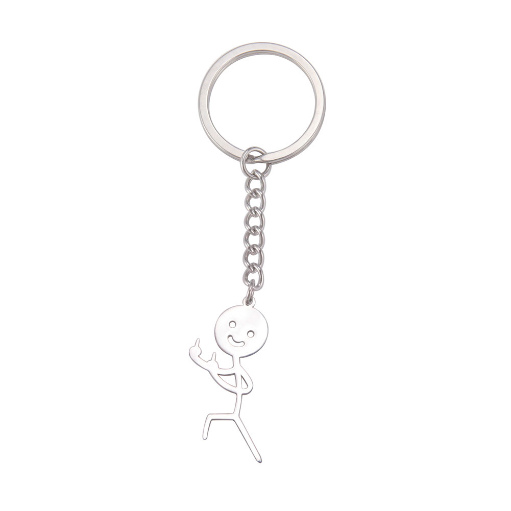 Venta caliente personalizada lindo todo partido simple golpe hueco cara sonriente villano brillante colgante llavero de acero inoxidable