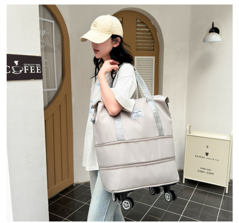 Extra large capacity travel bag, security lock universal wheeled maternity bag, short distance business trip airplane bag storage bag