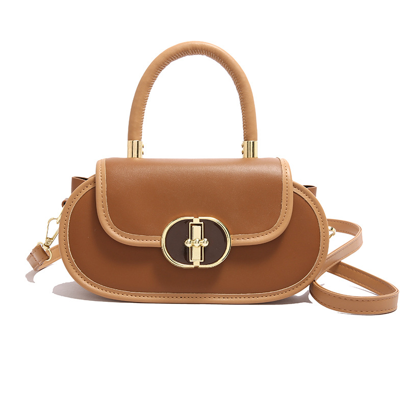 Bolso de diseño de nicho de textura 2024 invierno nuevo bolso de mujer moda manzana bloqueo mochila bolso de mano de estilo occidental