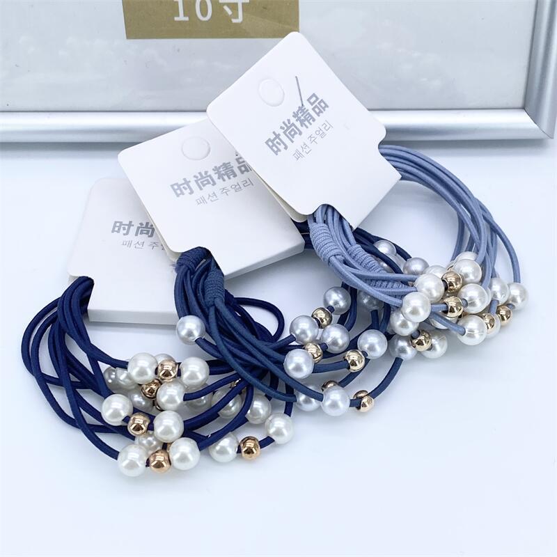 Estilo coreano tres-en-uno perla anudada banda de pelo alta elástica hecha a mano anudada banda de pelo 2 yuanes tienda