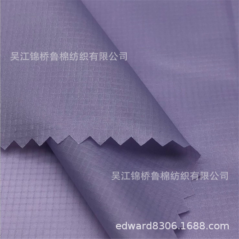 涤塔夫格子0.3-0.5平格浮格米通提花印花轧光压花复合TPU烫金植绒