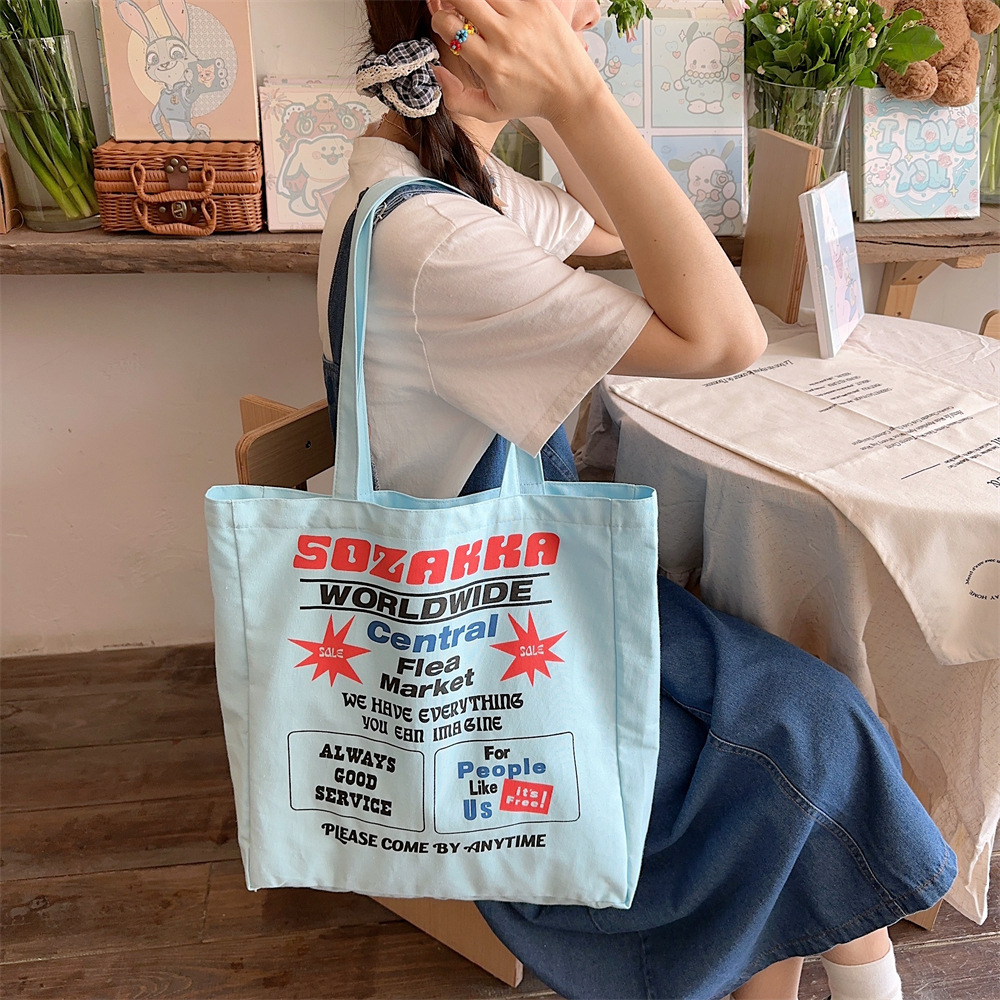 4423 New 2024 printed single-shoulder bag, large-capacity fabric bag, women's canvas bag, trendy hand-held commuting bag for work Application Scenario