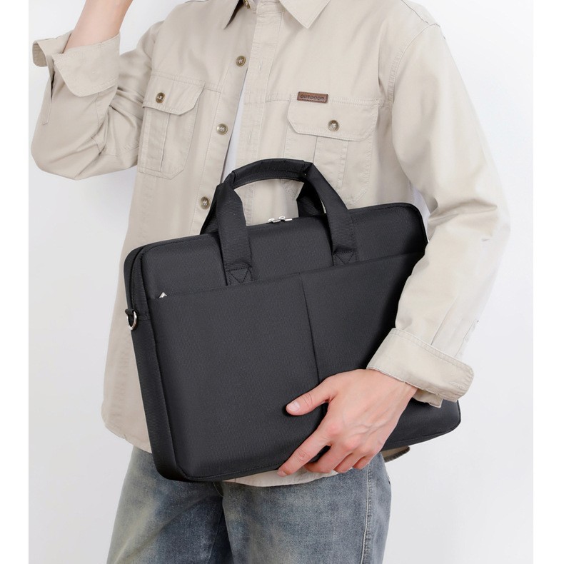 Bolso de computadora portátil nuevo estilo simple de color sólido colgar varilla de tracción maletín de viaje anti-dropper mochila de hombro resistente al desgaste