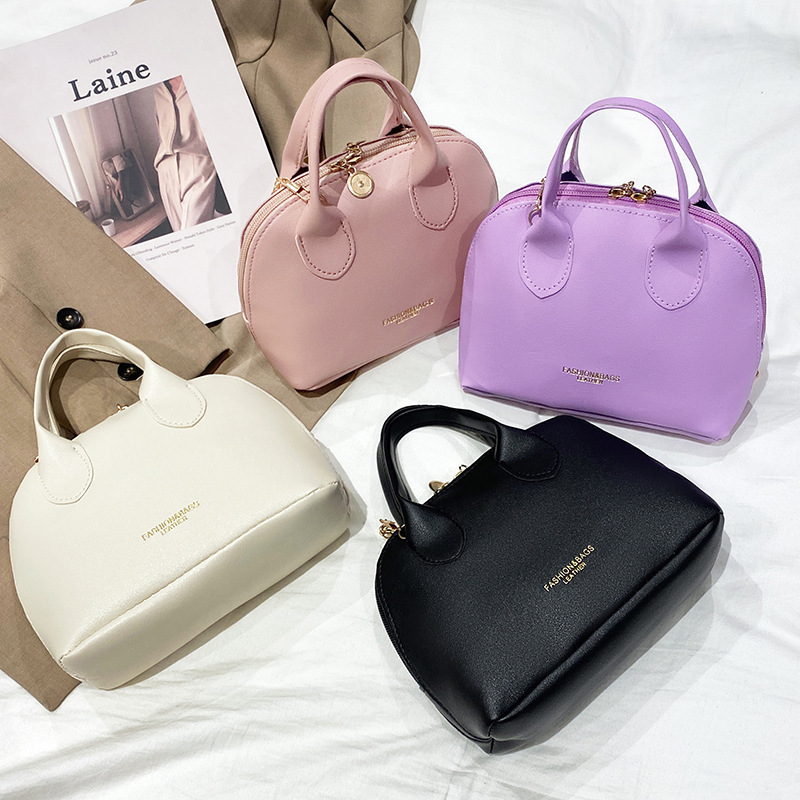 Bolso de comercio exterior transfronterizo mujer 2022 moda coreana impresión de hombro mochila bolso de mujer bolso de teléfono móvil al por mayor