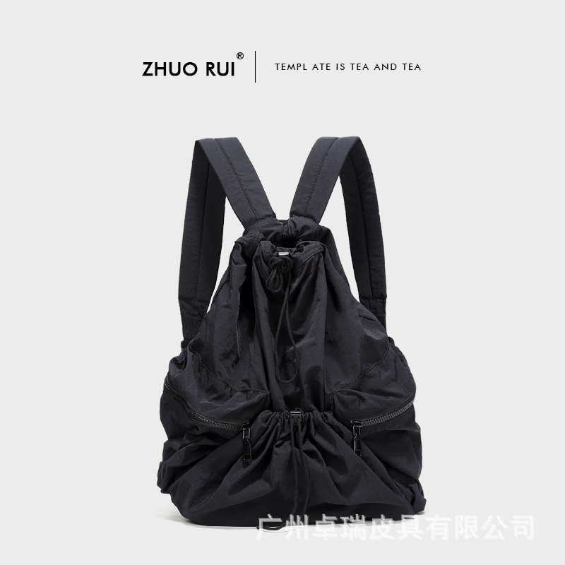 Corea del Sur Dongdaemun nuevo cordón mochila mujer casual gran capacidad estudiante mochila versátil mochila de nylon ligero