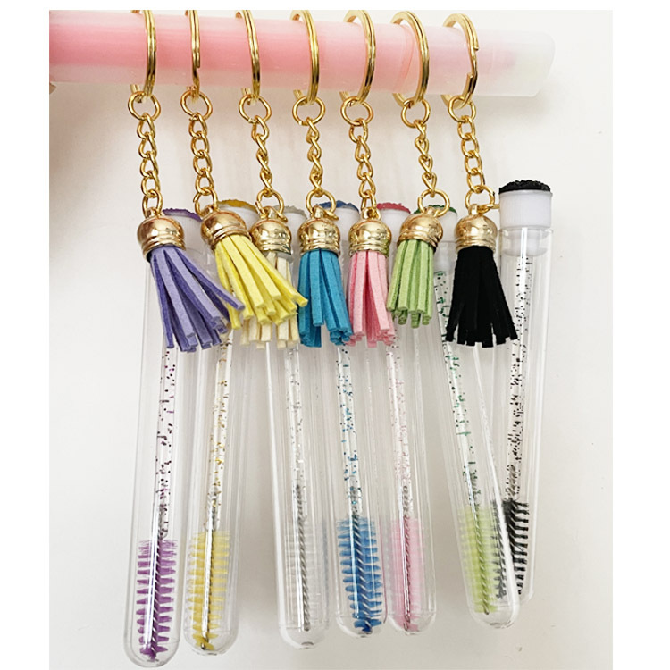 2022 nuevo producto con borlas y llavero tubo cepillo de pestañas tubo independiente cepillo de pestañas postizas rizador de diamantes multicolor