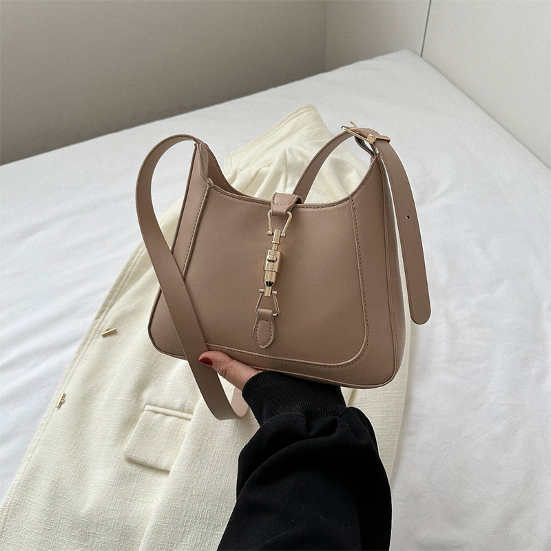 Bolsa de axilas bolsa de textura para mujer verano 2023 nuevo diseño de moda bolsa de mensajero bolsa de palo francés bolsa de hombro simple