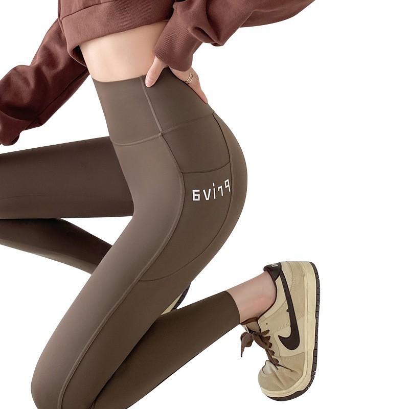 夏の薄いタイプのサメのズボンのポケットの運動のガードルのバービーのズボンの女性は腰を高くして腹を収めて外に行って気まずいことがない線の底のズボンを着ます。