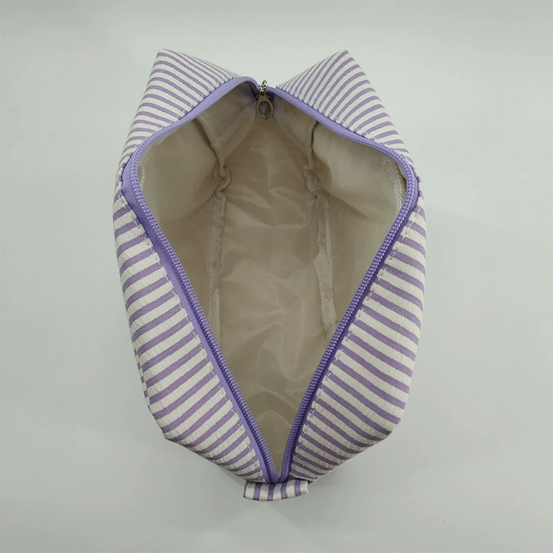 Capacious cosmetic bag, handheld storage bag for traveling