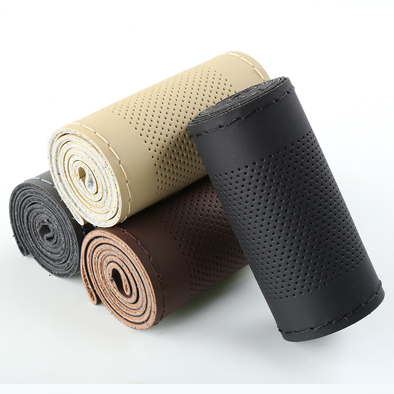 La mano de microfibra artificial que cose la cubierta del volante del coche cuatro estaciones cubierta universal de la manija del coche suministros transfronterizos del interior del coche