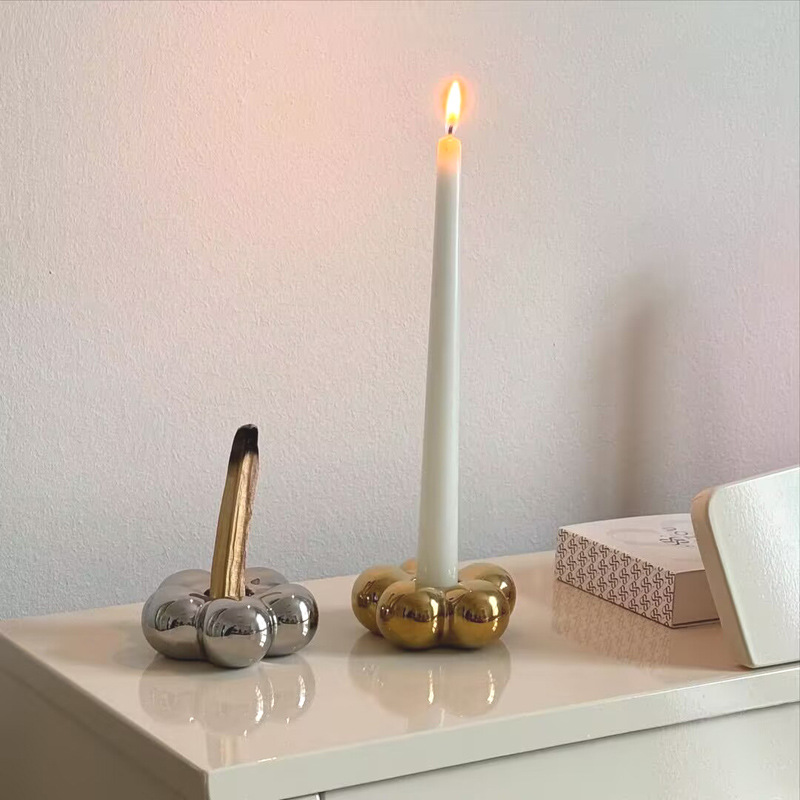 Decoraciones de cerámica dorada moderna simple transfronteriza sala de estar mesa vela asiento decoración de boda props