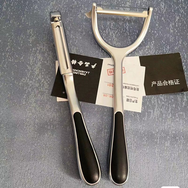 ドイツのステンレスの皮むき刀の台所の家庭用皮むきの神器の果物の野菜の果物はステンレスの皮むき刀を削ります。|undefined