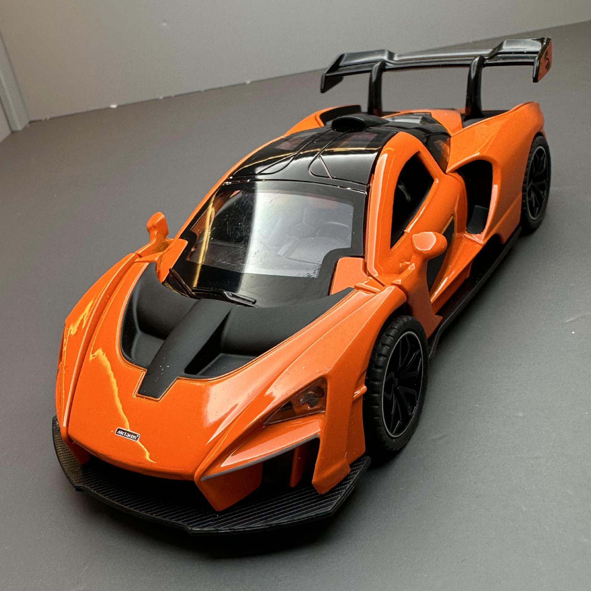 (2개) 새로운 오스트리아 합금 자동차 모델 1:32 MCLAREN SENNA는 소리와 가벼운 장난감 자동차 모델 장식품을 개발하기 위해 다시 럭셔리카 로고.