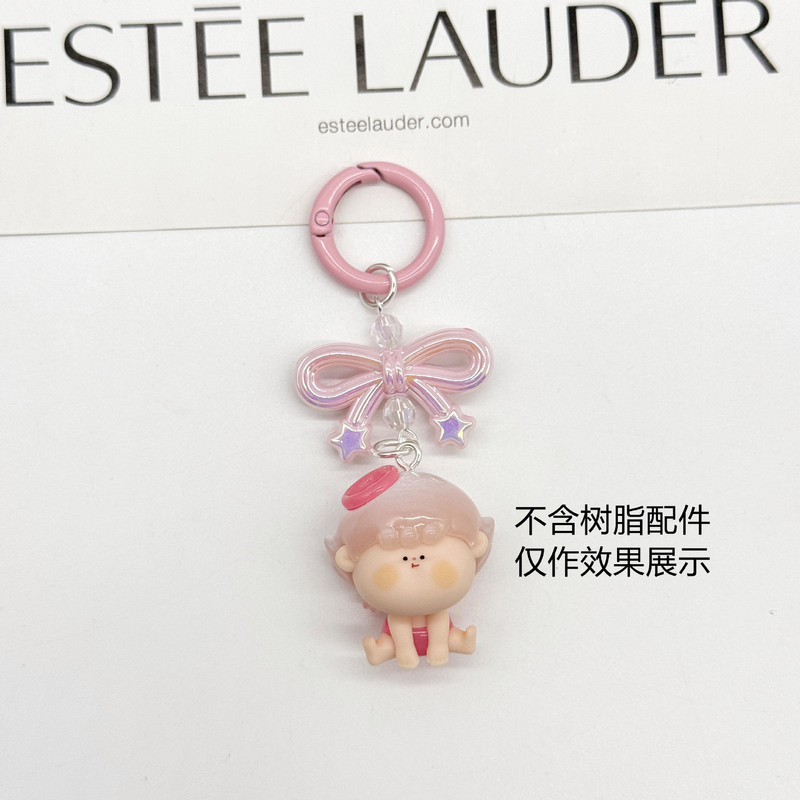 蝶結びのキーホルダーのカバンはスプリングを掛けてdiyのアクセサリーの部品を掛けます。|undefined