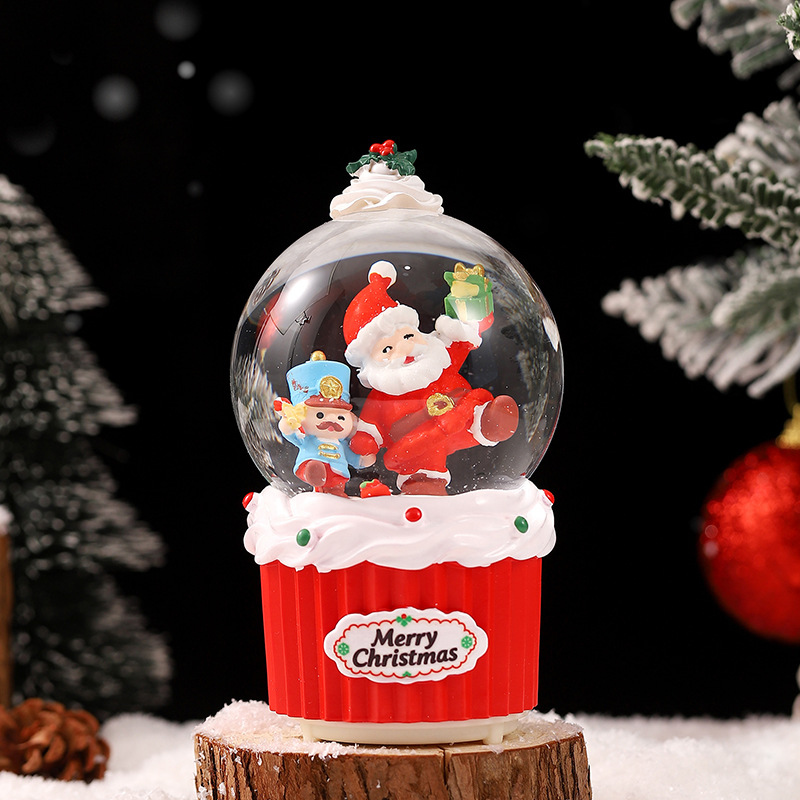 Una variedad de regalos de decoración de Navidad Navidad iluminante bola de cristal caja de música ventana diseño de velas lámparas de viento árbol de Navidad