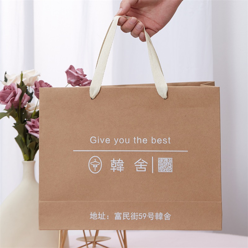 牛皮纸袋服装店袋子时尚礼品购物包装袋大号手提袋加厚印logo图案