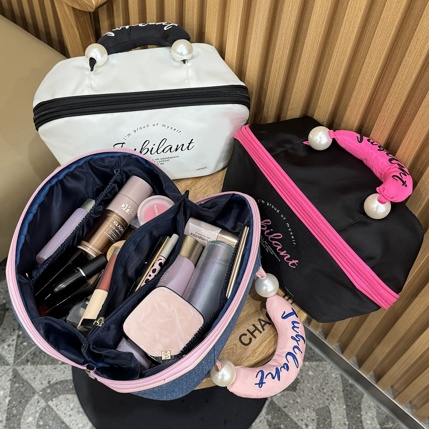 Handheld brand cosmetic bag, capacious storage system for traveling