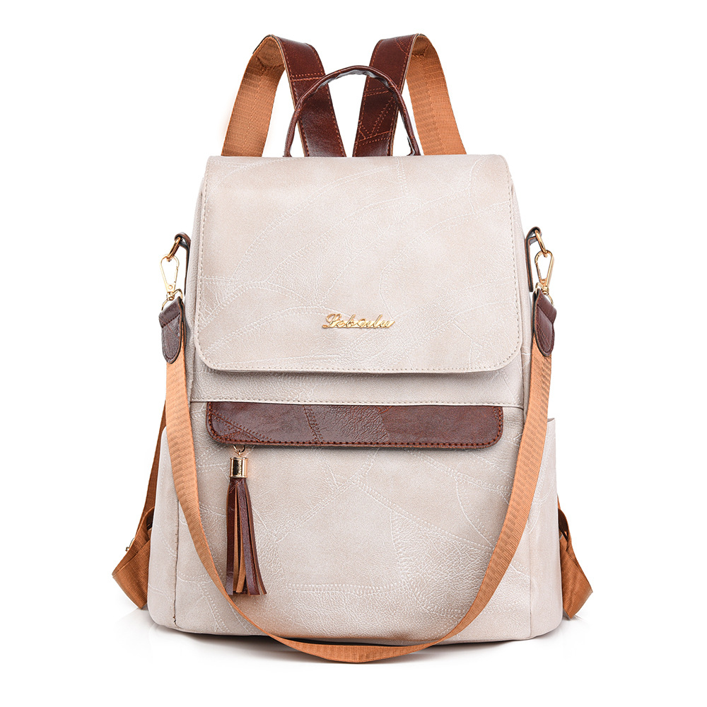 2024 invierno nuevo estilo europeo y americano retro damas mochila antirrobo moda borla mochila de tres usos de gran capacidad al por mayor