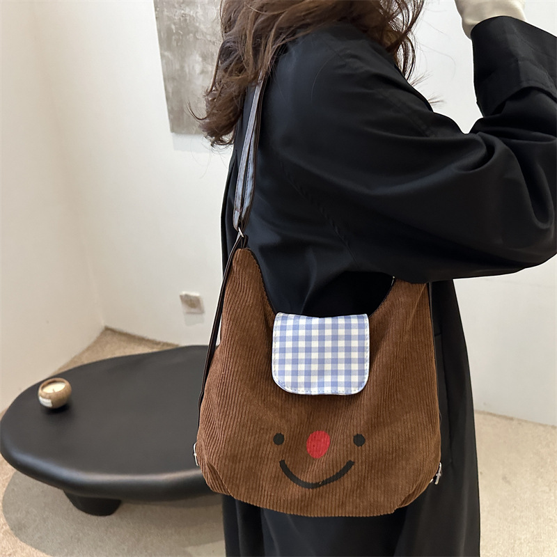 Vintage velcro nariz roja sonriente bolso de mano para mujeres otoño y invierno 2024 gran capacidad mochila de viaje mochila