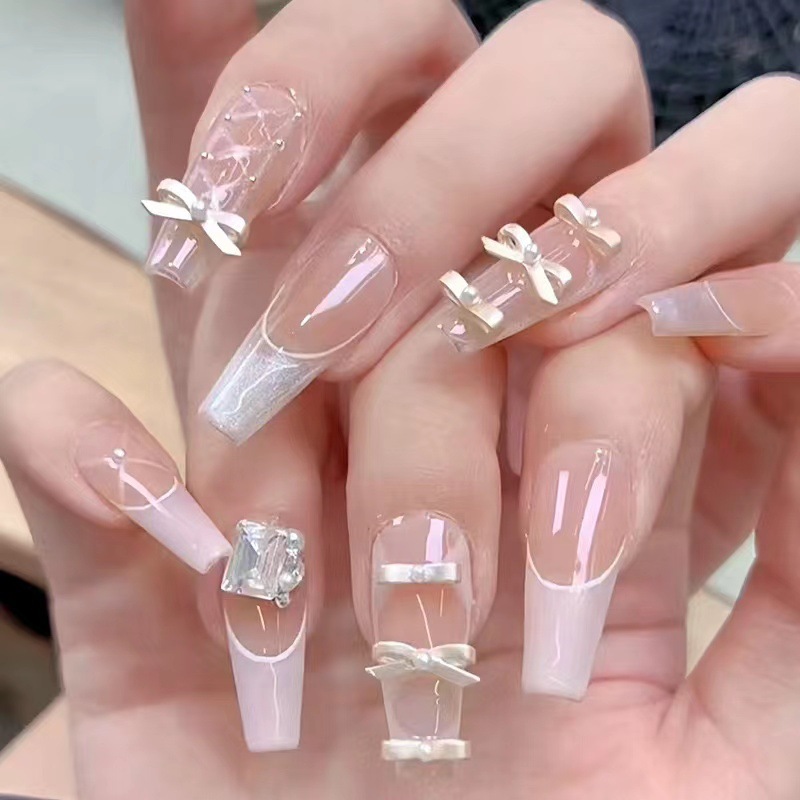 Pequeño libro rojo explosión zapatos de ballet arco flotante joyería de manicura corbata tridimensional 10 paquetes de aleación