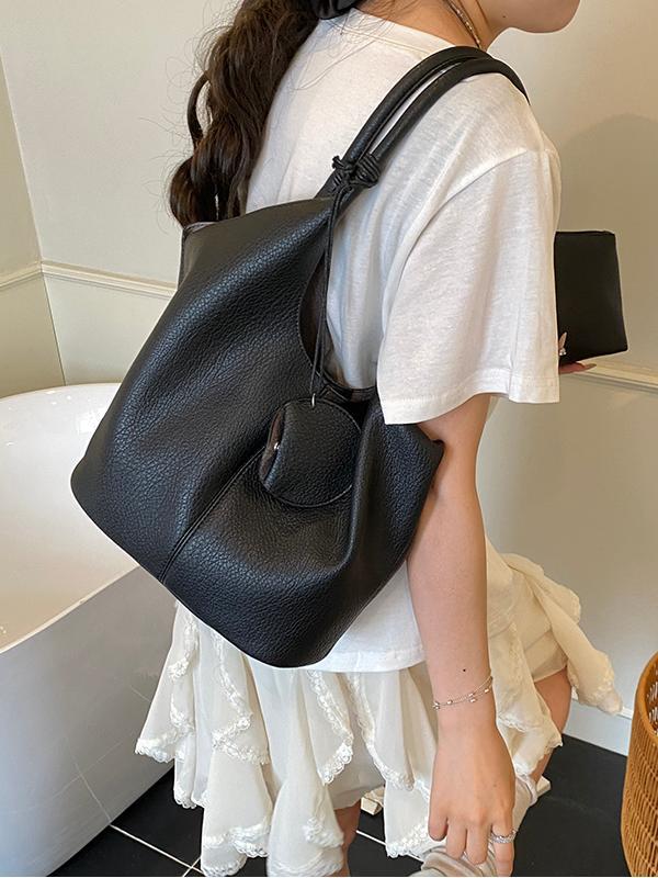 Bolso de cubo de axila de estilo explosivo transfronterizo para mujer 2025 nuevo bolso de hombro de cuero suave de viajero salvaje simple bolso de niño y madre de todo fósforo