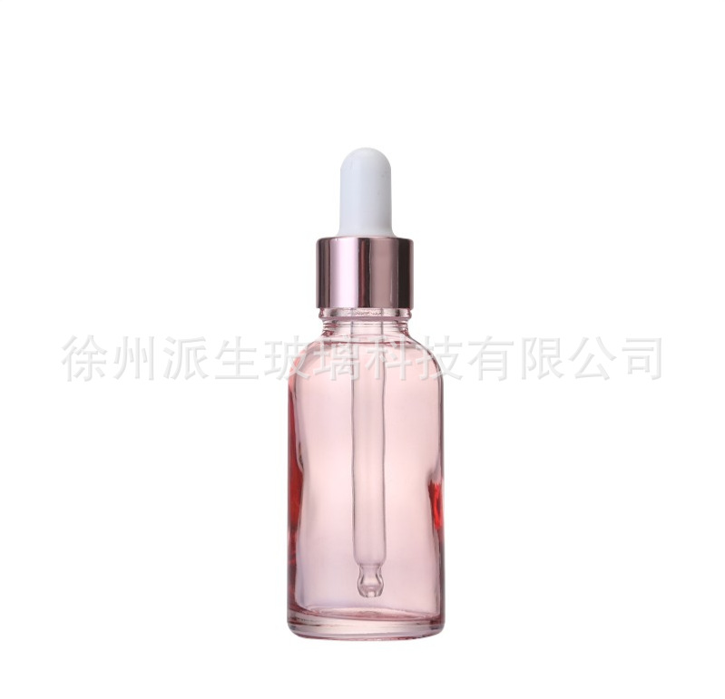 Venta al por mayor 10ml melocotón transparente vidrio Rosa botella de aceite esencial 20ml cosmética sub-botella Rosa anillo de oro botella de vidrio