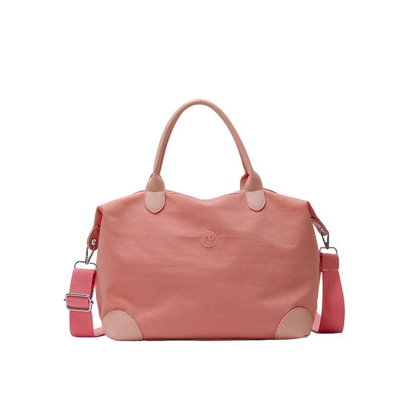 Nueva bolsa coreana para niños, bolsa de viaje ligera de gran capacidad, bolsa de mano casual simple de color sólido para niños y niñas