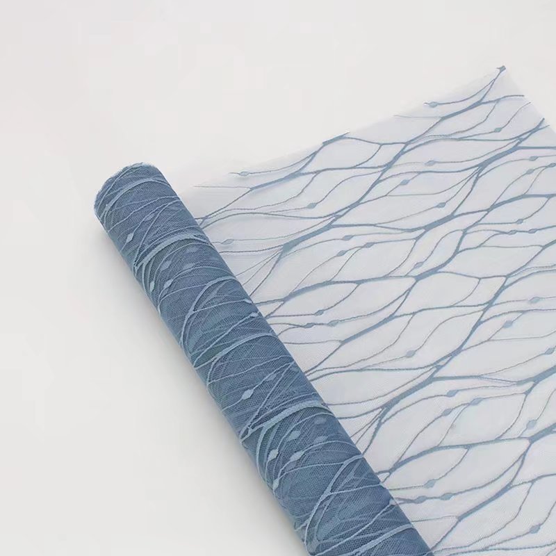 Fabricantes de fiestas de flores paquete de flores Jacquard sólido paquete de flores material de paquete de flores cortina de tela