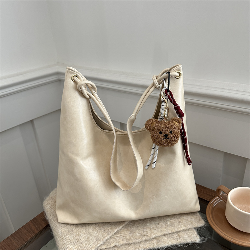 Bolso de brazo retro para mujeres 2025 primavera nueva moda hollow coreana bolso especial de gran capacidad empalmado bolso de hombro