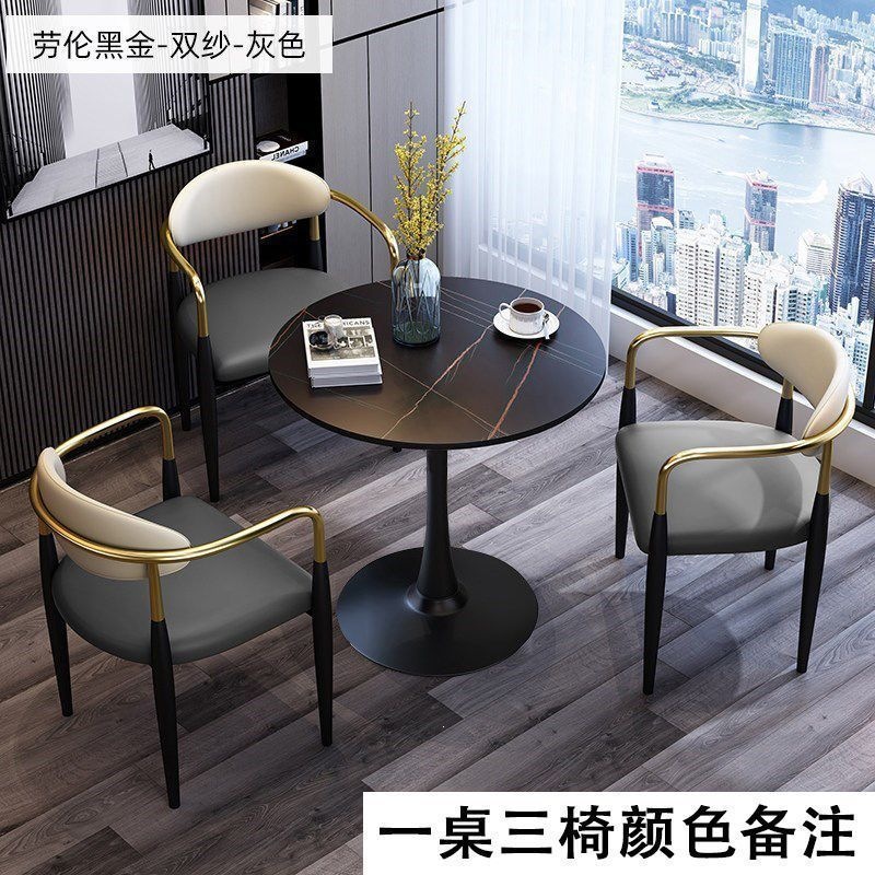 Black legs + black rock slab table with three chairs [color to be specified]