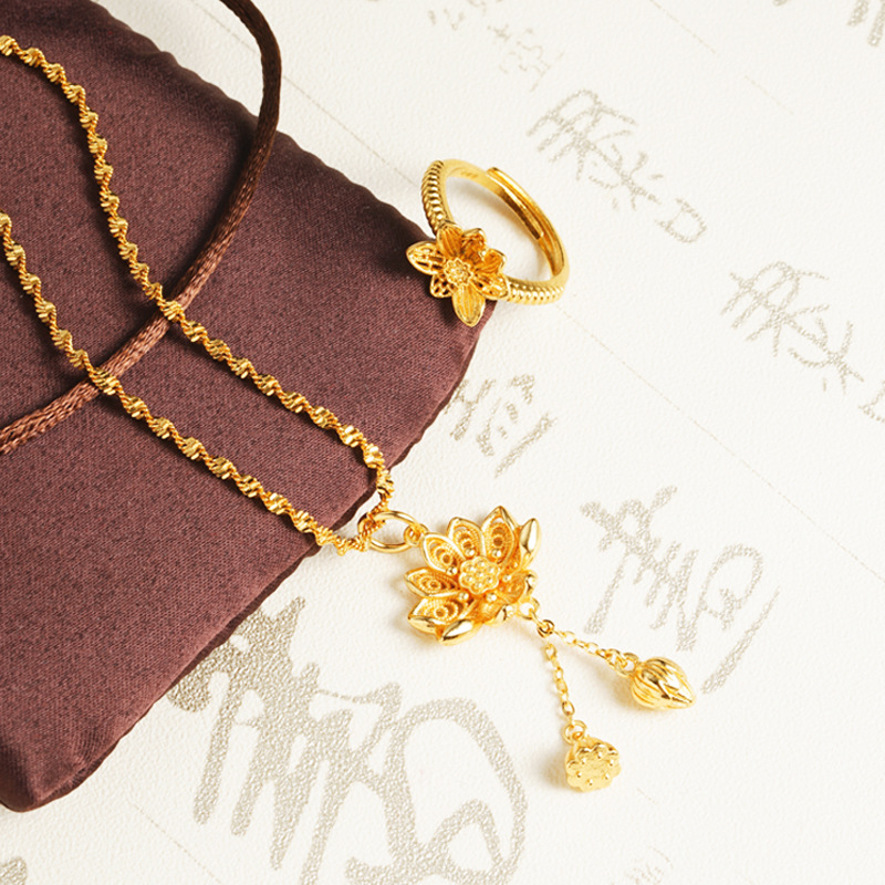 Collar de oro de arena para mujer, sentido de alta calidad, loto, nuevo traje de estilo chino, anillo de pendientes, joyería de todo fósforo que no se desvanece durante mucho tiempo al por mayor