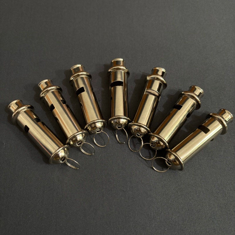 Metallic cylindrical whistle, durable and unique with a loud sound, suitable for outdoor gatherings and sports competitions