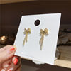Earrings from pearl with bow, silver needle, simple and elegant design, silver 925 sample