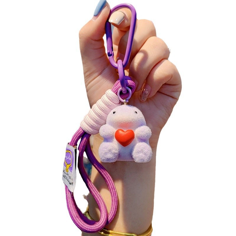 Nuevo caricatura flocado amor Godzilla llavero de moda pareja llavero bolsos de mujer accesorios colgantes de teléfono móvil joyas