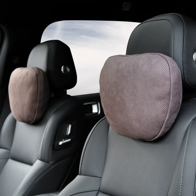 Headrest: Cushion Neck Pillow Cushion Seat - pair-of-punched-headrests-shared-by-driver-and-passenger-brown