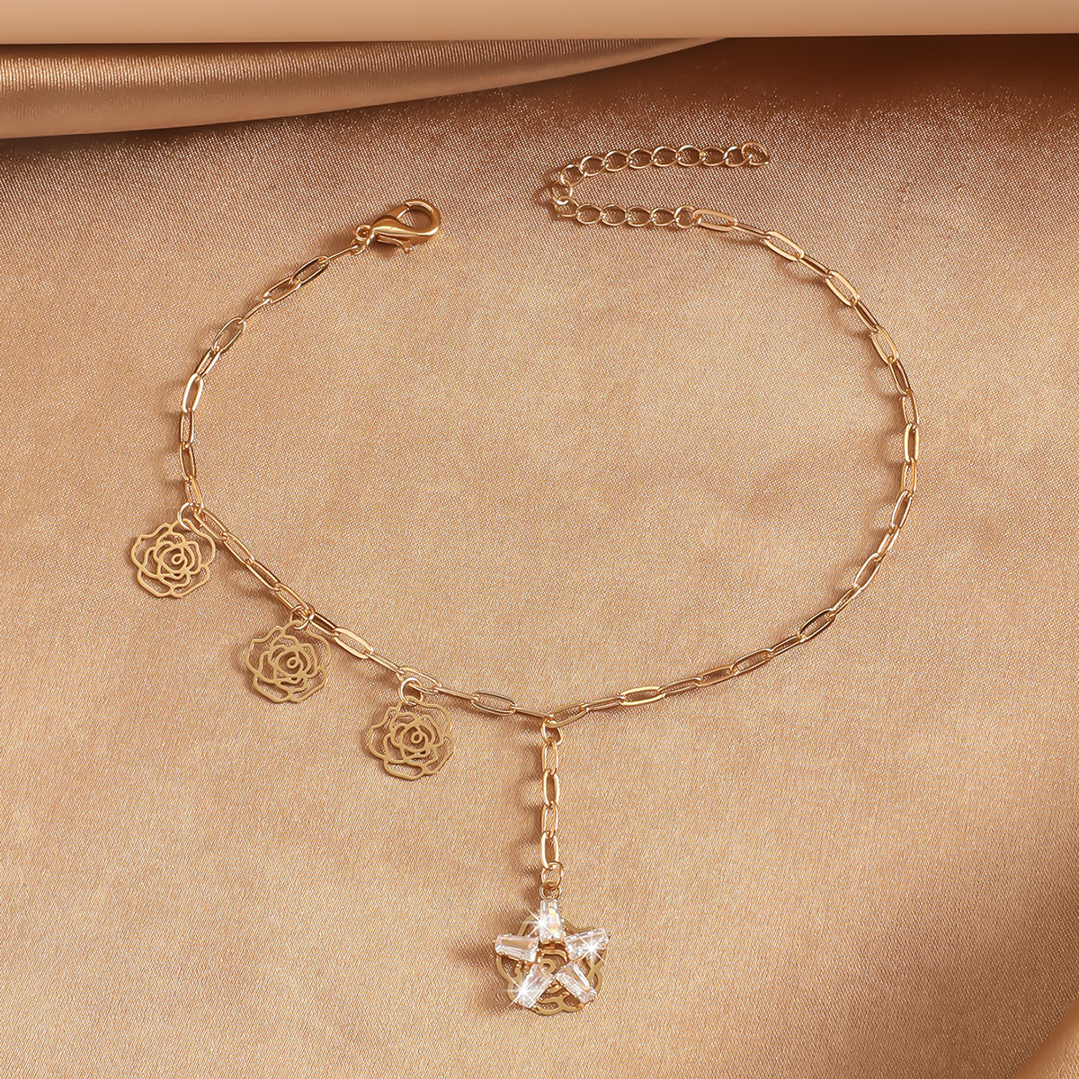 Zircon de cobre de viento frío de metal de doble tobilla de nicho de diseño femenino mariposa cadena de oro suministro transfronterizo