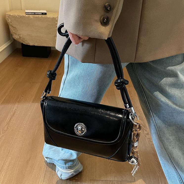 Bolsos debajo de las axilas de piel de cera retrógrada para mujeres 2025, nuevos bolsos de hombro de tendencia universal, bolsos de alta calidad coreanos.