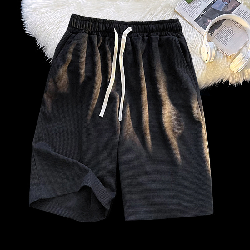 Directo de fábrica de verano de color sólido waffle shorts hombres de moda simple marca suelta quinta pantalones juventud Pantalones rectos