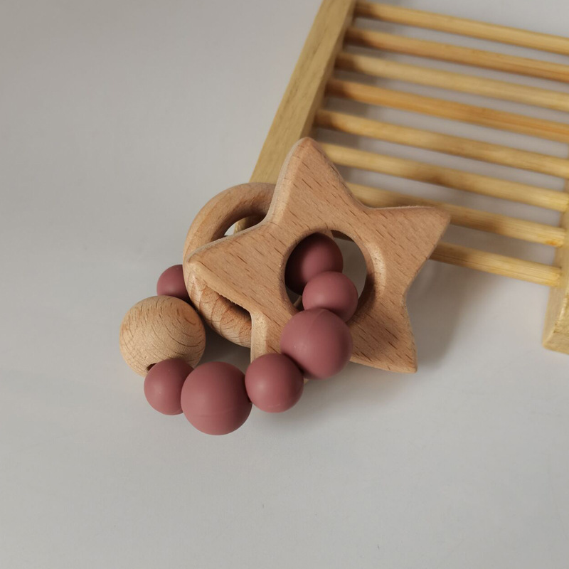 Nuevo bebé suministros de dibujos animados estrella haya mordedor creativo bebé mordedura de silicona pulsera molar teether