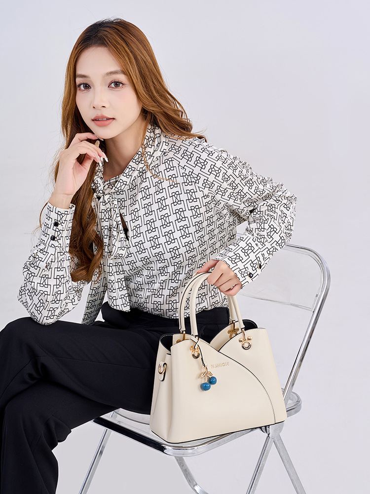 Bolso de cuero para mujeres, bolso de viaje de cuatro estaciones, bolso de moda de madres de mediana edad, bolso de alta calidad, bolso de mujer.